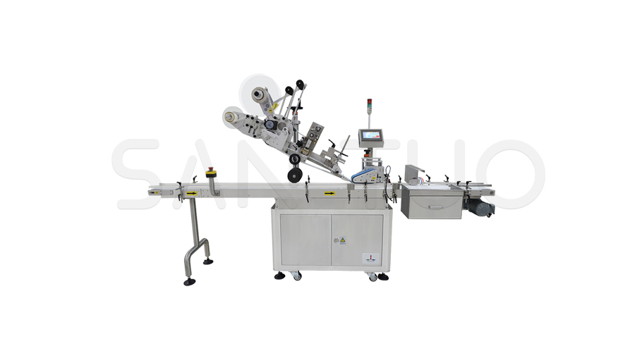 Upper surface labeling machine